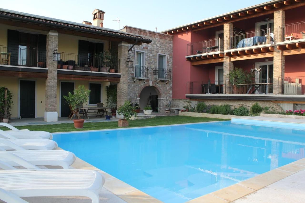 Residence Tasso Canossa - Appartamento Con Piscina Lazise Exterior foto