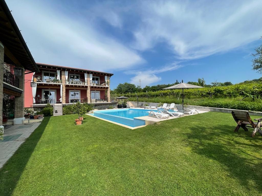 Residence Tasso Canossa - Appartamento Con Piscina Lazise Exterior foto